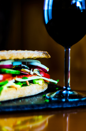 Red Wine and sandwich, dry wine perfect for eating, a gourmet setの写真素材