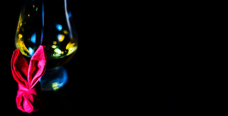 Single malt whiskey in a glass of tasting with napkin bunny, festive Easter decoration, holidayの写真素材