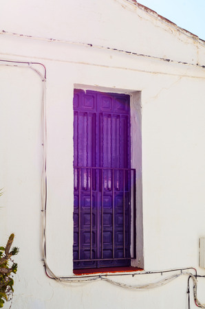 Stylish balcony with a metal railing, solid architectural element, a place of rest and relaxation, vintage decor, balconyの写真素材