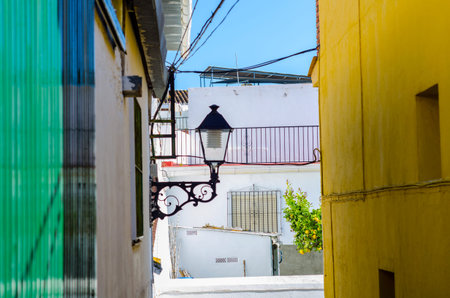 old stylish street lamp illuminating the Spanish street, a characteristic element of traditional street architecture, decorの写真素材