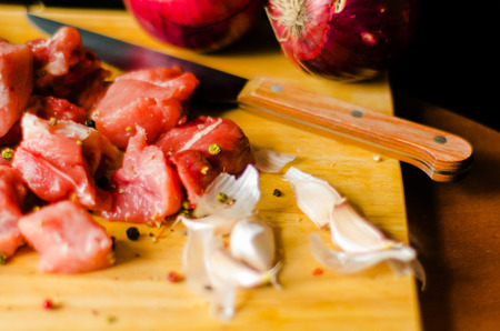 Raw meat cut into pieces, pork prepared for cooking, red meat, cuisineの写真素材