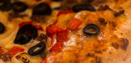 Close up on delicious pizza in cardboard, pizza delivered to your home in a special packaging, fast foodの写真素材