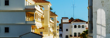 Stylish balcony with a metal railing, solid architectural element, a place of rest and relaxation, vintage decor, balconyの写真素材
