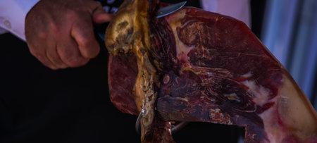 Leg jamon serrano prepared for slicing, traditional Spanish ham, meat