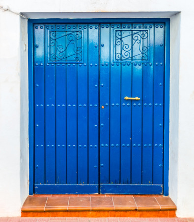 Old door with interesting texture, element of architecture, interesting entrance to the building, vintage style, entranceの写真素材