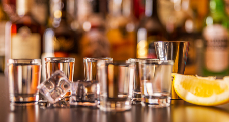 Traditional pure vodka in glasses on a black background, chilled drink, nightlifeの写真素材