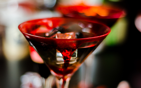 Creepy Halloween party cocktails with blood, spiders and ice cubes, drinks at partyの写真素材