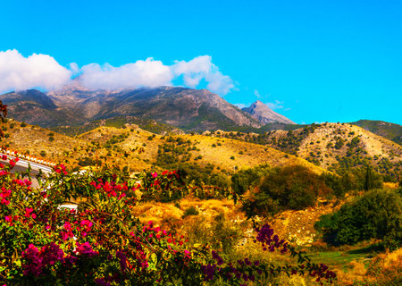 Beautiful view of the mountains in the region of Andalusia, houses and farmland on the slopes of mountains, natureの写真素材