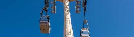 Cableway against the sky, transport at height and tourist attraction, travelの写真素材
