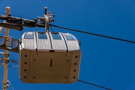 Cableway against the sky, transport at height and tourist attraction, travelの写真素材