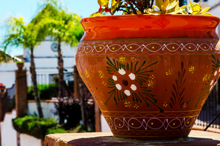 Beautiful ceramic flower pot on a pedestal with flowers, decoration of urban space,
outdoor decoration, decor streetの写真素材