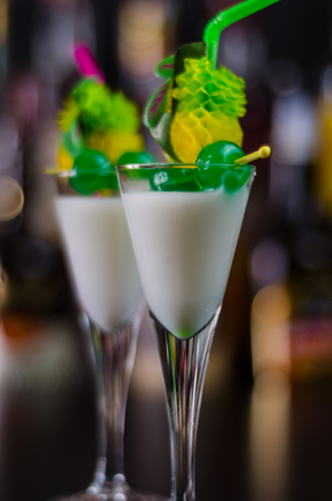 Exotic drink based on rum and other ingredients, cocktail prepared by the bartenderの写真素材