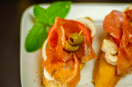 Traditional Spanish tapas for lunch table, mini sandwiches food set,  delicious snack appetizer,  foodの写真素材