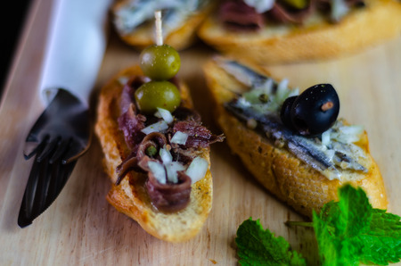 Spanish seafood tapas, mini sandwiches food set,  delicious snack appetizer, lunchの写真素材
