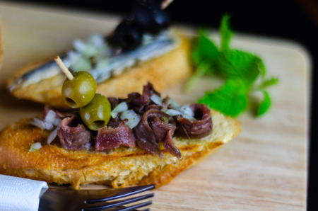 Spanish seafood tapas, mini sandwiches food set,  delicious snack appetizer, lunchの写真素材