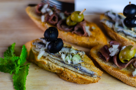 Spanish seafood tapas, mini sandwiches food set,  delicious snack appetizer, lunchの写真素材