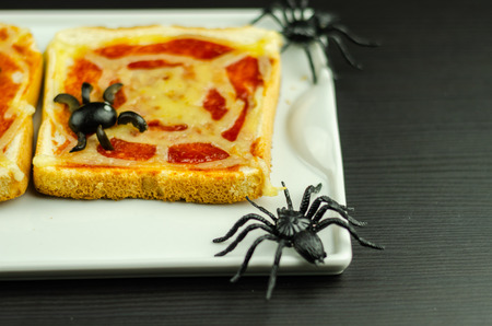 Funny sandwiches with  spider and  spider web for Halloween party, scary foodの写真素材
