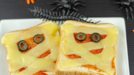 Funny sandwiches with mummy for a Halloween party, creative serving of food, scaryの写真素材