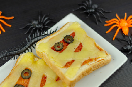 Funny sandwiches with mummy for a Halloween party, creative serving of food, scaryの写真素材