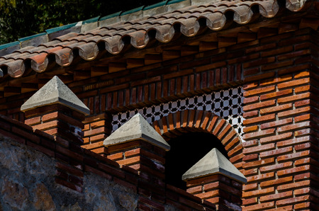 Typical Moorish defensive walls in a small town of Andalusia, a historic element of architecture, Spainの写真素材