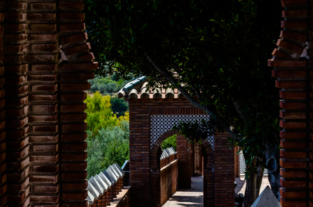 Typical Moorish defensive walls in a small town of Andalusia, a historic element of architecture, Spainの写真素材