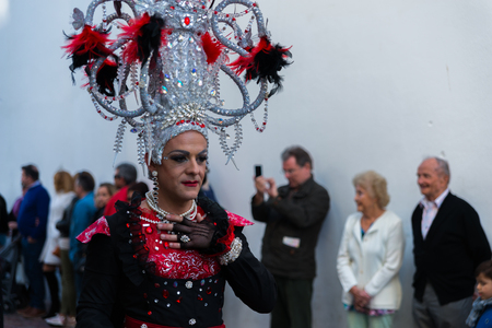 NERJA, SPAIN - FEBRUARY 11, 2018
People in costumes celebrating "Burial of the Sardine" in 
 Malaga province, funeral parade, carnivalのeditorial素材