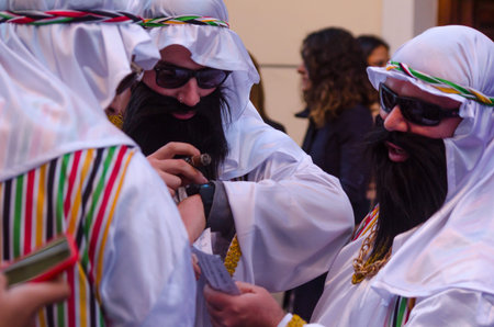 NERJA, SPAIN - FEBRUARY 10, 2018People in costumes celebrating carnival in Malaga province,...