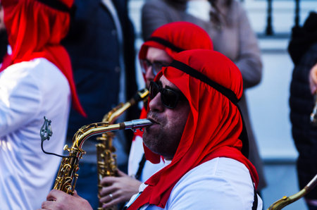VELEZ-MALAGA, SPAIN - FEBRUARY 3, 2018People in costumes celebrating carnival in Malaga province,...
