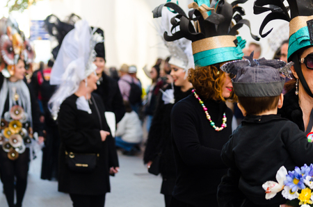 NERJA, SPAIN - FEBRUARY 11, 2018
People in costumes celebrating "Burial of the Sardine" in 
 Malaga province, funeral parade, carnivalのeditorial素材