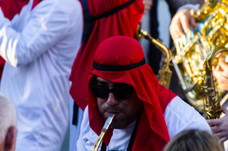 VELEZ-MALAGA, SPAIN - FEBRUARY 3, 2018People in costumes celebrating carnival in Malaga province,...