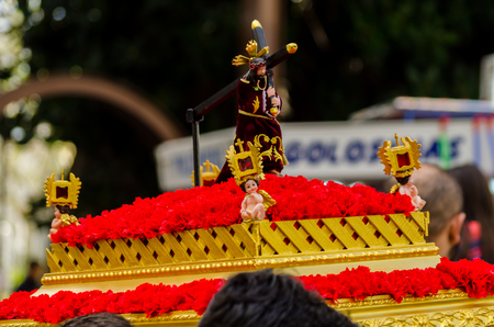 Procession of children starting the holy week.
Children in the procession wear platforms with images of saints. Traditional celebration of the Catholic holiday in Andalusia.のeditorial素材