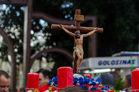 Procession of children starting the holy week.
Children in the procession wear platforms with images of saints. Traditional celebration of the Catholic holiday in Andalusia.のeditorial素材