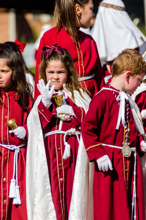 VELEZ-MALAGA, SPAIN - MARCH 27, 2018 People participating in the procession  in the Holy Week in a Spanish city, easterのeditorial素材