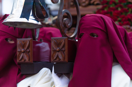 VELEZ-MALAGA, SPAIN - MARCH 24, 2018 People participating in the procession  in the Holy Week in a Spanish city, easterのeditorial素材