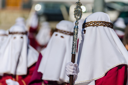 VELEZ-MALAGA, SPAIN - MARCH 27, 2018 People participating in the procession  in the Holy Week in a Spanish city, easterのeditorial素材