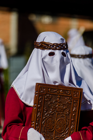 VELEZ-MALAGA, SPAIN - MARCH 27, 2018 People participating in the procession  in the Holy Week in a Spanish city, easterのeditorial素材