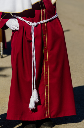 VELEZ-MALAGA, SPAIN - MARCH 27, 2018 People participating in the procession  in the Holy Week in a Spanish city, easterのeditorial素材