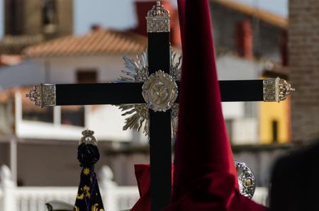VELEZ-MALAGA, SPAIN - MARCH 29, 2018 People participating in the procession  in the Holy Week in a...