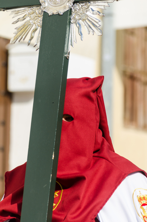 VELEZ-MALAGA, SPAIN - MARCH 29, 2018 People participating in the procession  in the Holy Week in a Spanish city, easterのeditorial素材