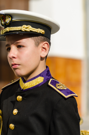 VELEZ-MALAGA, SPAIN - MARCH 29, 2018 People participating in the procession  in the Holy Week in a Spanish city, easterのeditorial素材