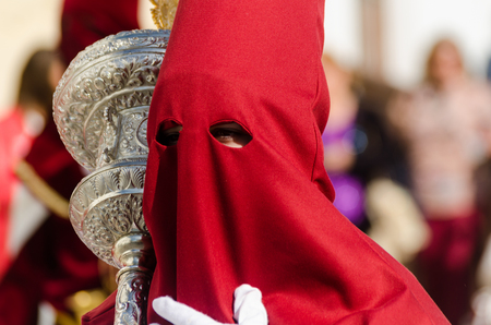 VELEZ-MALAGA, SPAIN - MARCH 29, 2018 People participating in the procession  in the Holy Week in a Spanish city, easterのeditorial素材