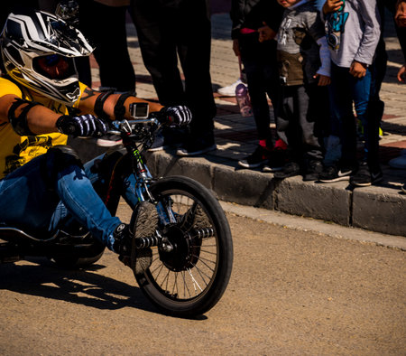VELEZ-MALAGA, SPAIN - APRIL 14, 2018 Autos Locos - traditional fun involving the ride of cardboard...