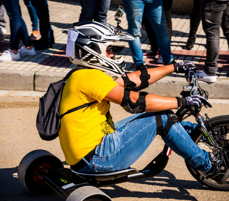 VELEZ-MALAGA, SPAIN - APRIL 14, 2018 "Autos Locos" - traditional fun involving the ride of cardboard cars, self-made vehicles, creative and cheerful eventのeditorial素材