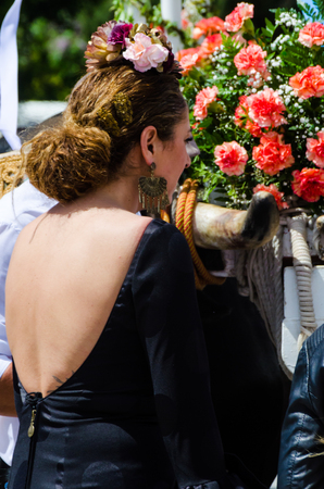 TORRE DEL MAR, SPAIN - APRIL 29, 2018 people participating in the celebration of the Catholic ceremony of transferring the holy figure in Spainのeditorial素材