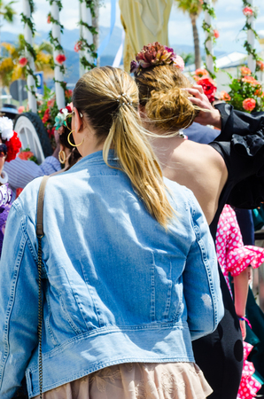 TORRE DEL MAR, SPAIN - APRIL 29, 2018 people participating in the celebration of the Catholic ceremony of transferring the holy figure in Spainのeditorial素材