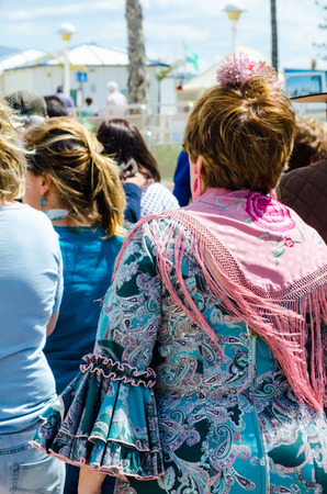TORRE DEL MAR, SPAIN - APRIL 29, 2018 people participating in the celebration of the Catholic ceremony of transferring the holy figure in Spainのeditorial素材