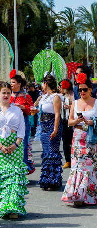 TORRE DEL MAR, SPAIN - APRIL 29, 2018 people participating in the celebration of the Catholic ceremony of transferring the holy figure in Spainのeditorial素材