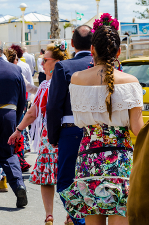 TORRE DEL MAR, SPAIN - APRIL 29, 2018 people participating in the celebration of the Catholic ceremony of transferring the holy figure in Spainのeditorial素材