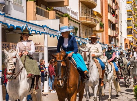 TORRE DEL MAR, SPAIN - APRIL 29, 2018 people participating in the celebration of the Catholic ceremony of transferring the holy figure in Spainのeditorial素材