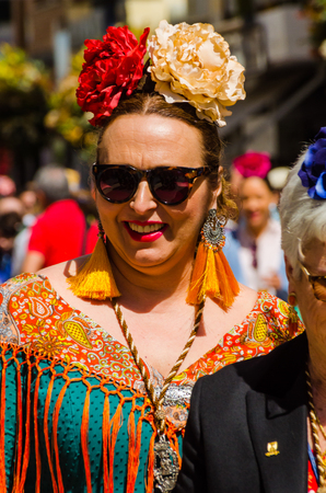 TORRE DEL MAR, SPAIN - APRIL 29, 2018 people participating in the celebration of the Catholic ceremony of transferring the holy figure in Spainのeditorial素材